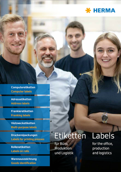 Four people in work attire are smiling together, surrounded by HERMA's label products and services.