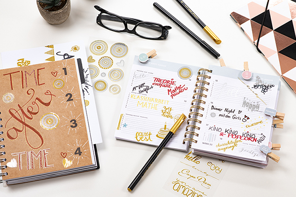 Creative stickers in various colors, sticking in a notebook.