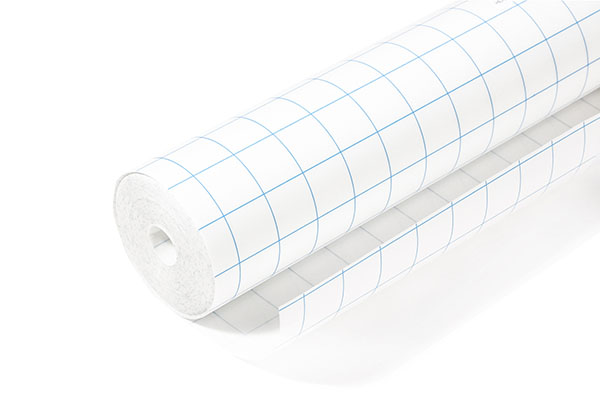 Self-adhesive film on a roll