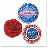 Three different vintage labels for skincare products, including 'Freckle Cream' and other brands, in various colors and designs.