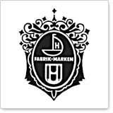Coat of arms featuring a stylized sailboat and the words 'FABRIK MARKEN' within a decorative frame.