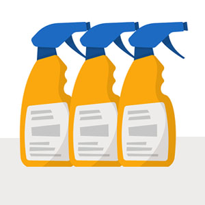 Three yellow spray bottles with blue nozzles arranged against a neutral background.