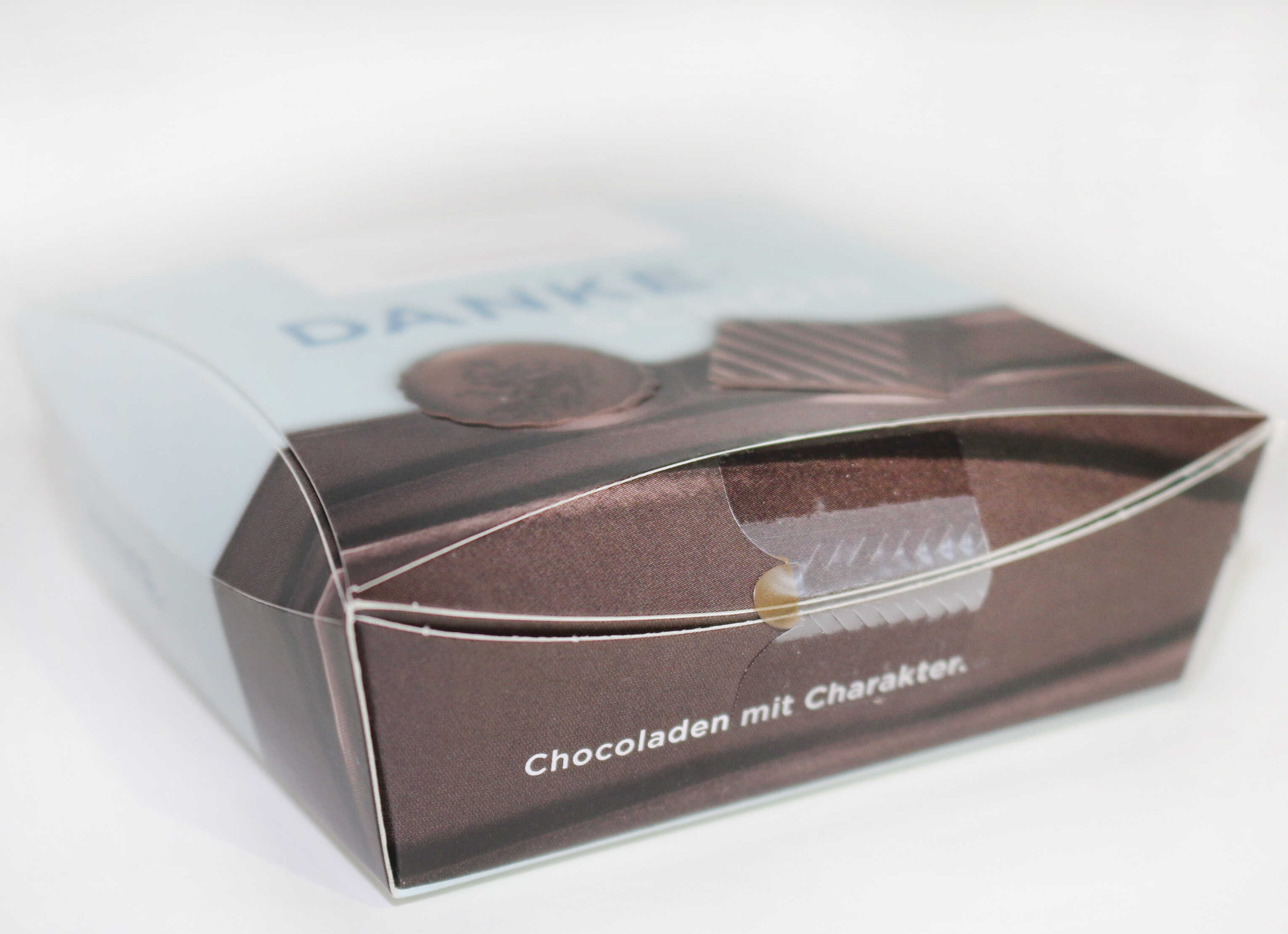 Box of chocolates, labeled with 'Thank You' and the text 'Chocolates with Character.