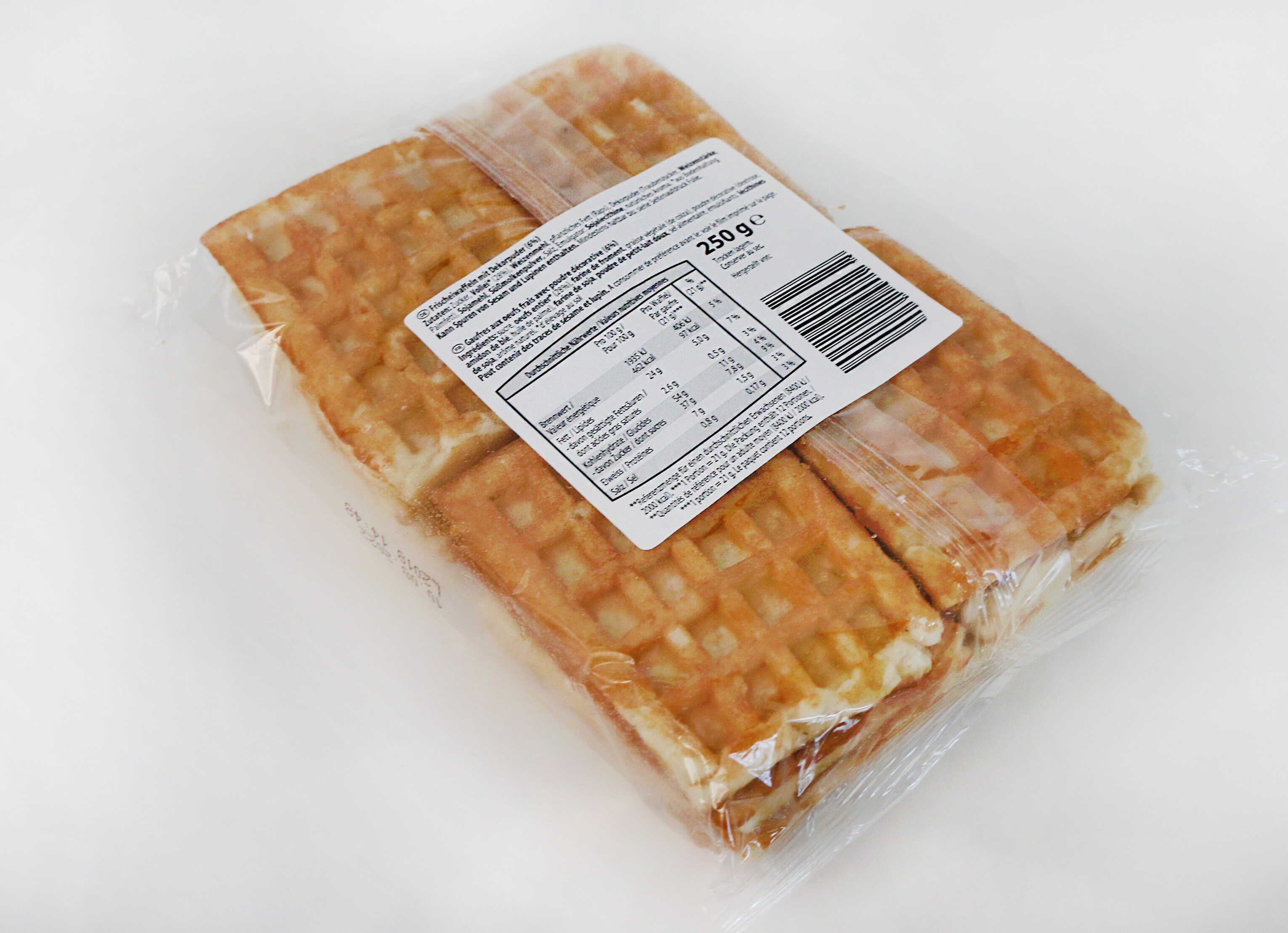 Packaging with waffles, 250 g, featuring nutritional information and an ingredients list on the label.