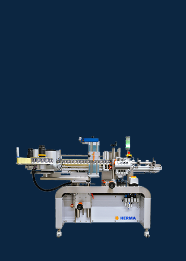 A labeling machine from HERMA, equipped with a conveyor belt and various control elements, set against a neutral background.