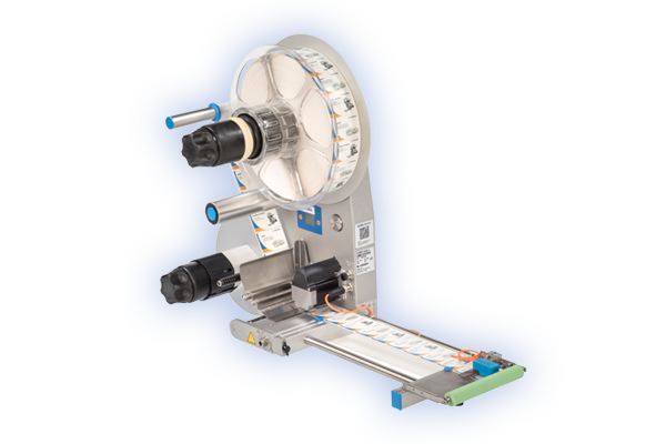 Labeling machine with roll holder that applies labels to a conveyor belt surface.