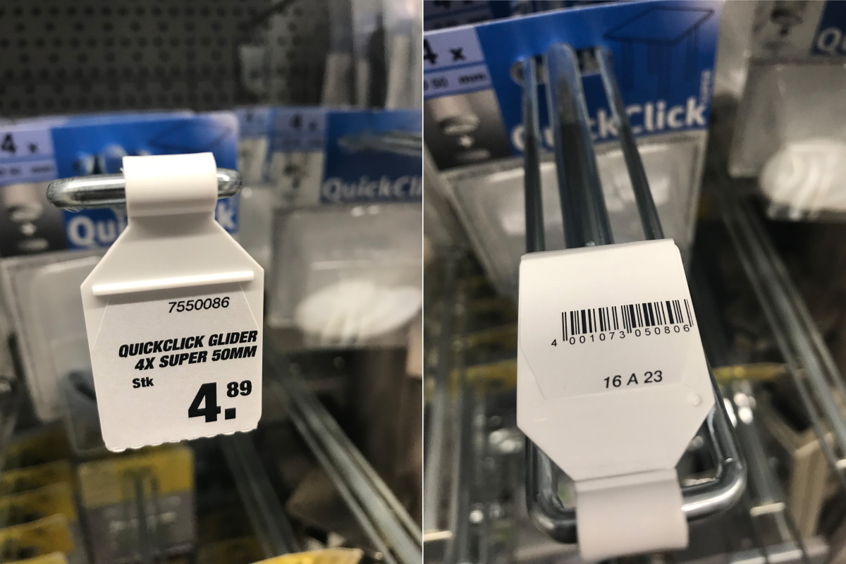 Solutions for the construction materials sector: Clip hooks with label flags in the hardware store, front and back.