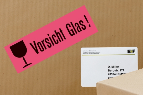 Warning label: Caution, glass on a package