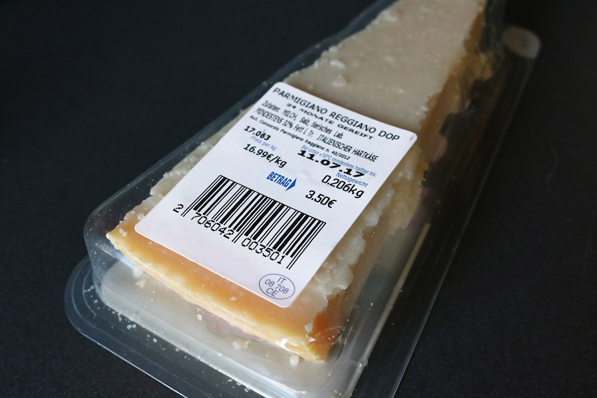 Food labeling: Product label, food label with barcode on plastic packaging of Parmesan.