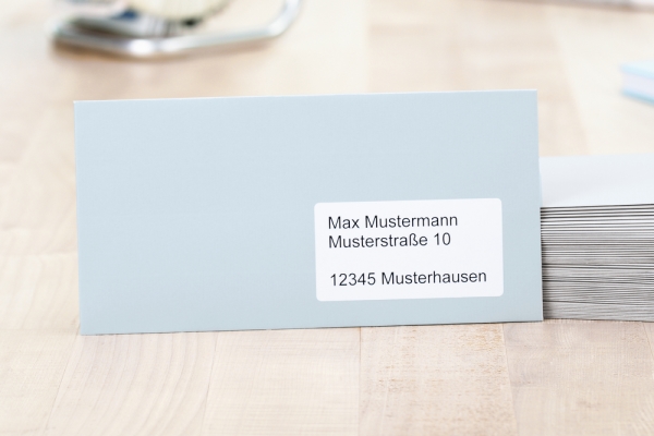 Shipping and pallet labels: Address label on light blue envelope
