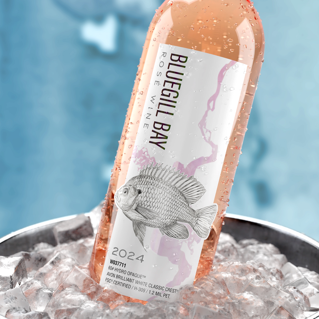 Bottle of Bluegill Bay Rosé wine in an ice bucket, featuring a fish design on the label and the year 2024.