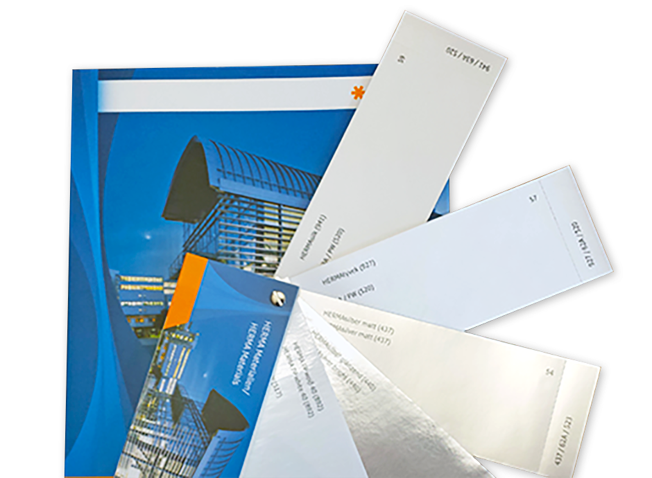 A binder with a blue cover and several white sheets, some of which are partially pulled out.