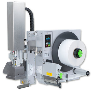 Labeling machine with a large roll holder, control panel, and a printing mechanism for labels.