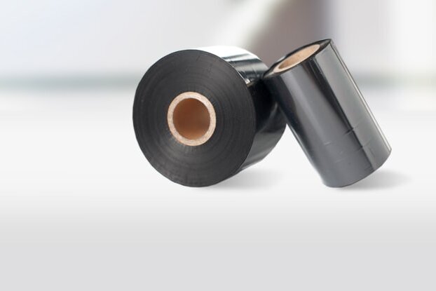 Several black thermal transfer ribbons (TT ribbons), landscape format