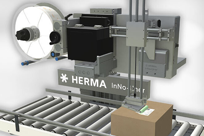 Automated labeling machine from HERMA that labels a package on a conveyor belt.