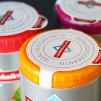 Closure Labels: Colored top closure label on salt dispenser from Bad Reichenhaller