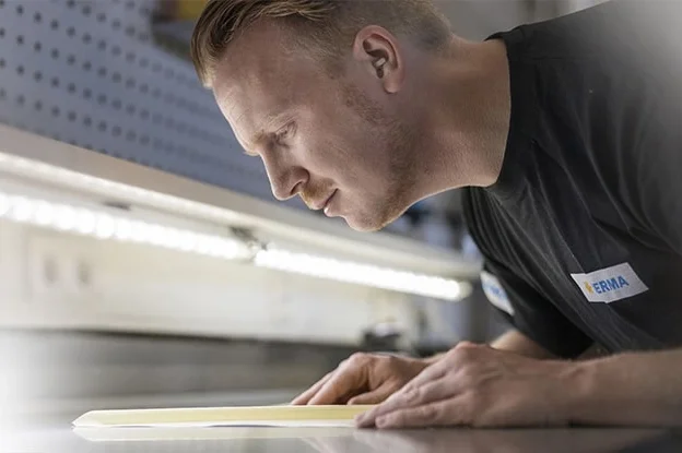 Employee in label inspection
