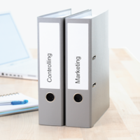 Two large binders with printed spine labels.