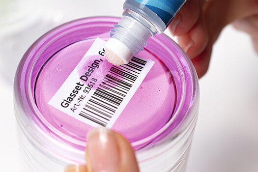 Folder with documents and the use of hole reinforcement rings.