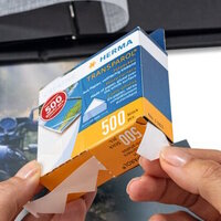 Take the photo corners out of the photo corner packaging.