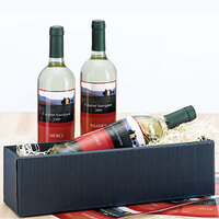 Decorated wine bottles with inkjet labels in a gift basket.
