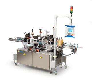 An automated labeling machine with multiple stations, control unit, and safety indicators.