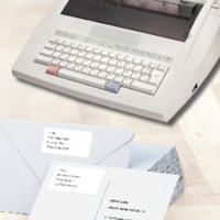 Typewriter and envelopes with printed address labels