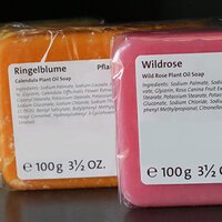 Product labeling stickers on wrapped colorful soap