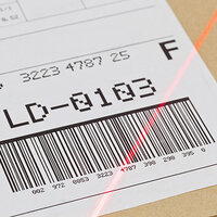Barcode on shipping label with red scanner line