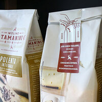 Printed resealable labels on polenta packaging