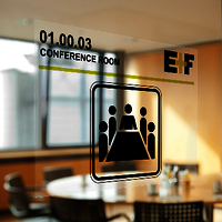 Transparent self-adhesive sign on conference room door