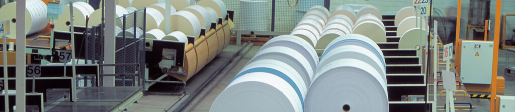 Adhesive material rolls in the trimming machine