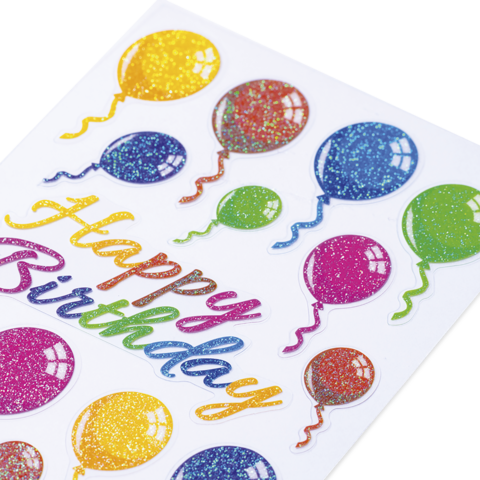 Bunte Luftballons in verschiedenen Farben mit dem Text "Happy Birthday" in glitzernder Schrift.