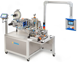 Automatic labeling machine with a control panel, equipped with various mechanical components and a screen for operation.