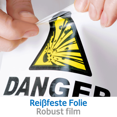 Eine Person zieht eine Warnfolie mit einem Gefahrensymbol ab. Der Text "Reißfeste Folie" und "Robust film" sind sichtbar.