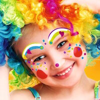 Child dressed as a clown with face art stickers.
