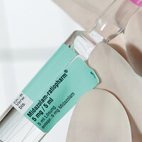 Green documentation label on a vial