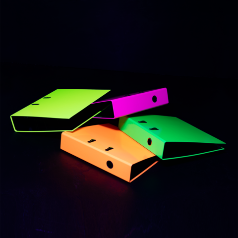 Colorful binders in neon colors (green, pink, orange) are stacked on top of each other against a dark background.
