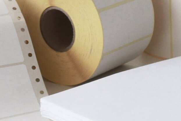 Blank labels: Collage of HERMA sheet labels, roll labels, and fold labels, landscape format.
