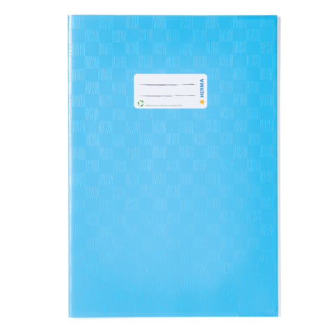 Blaues Notizbuch mit einem weißen Etikett auf der Vorderseite, das Platz für einen Namen und eine Adresse bietet.