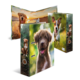 Folder with pictures of puppies playing in nature and looking happy, set against a bright, blurred background landscape.
