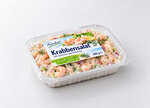 Crab salad with shrimp and dressing in a transparent packaging, labeled 'Fresh and Delicious' and weighing 200 g.
