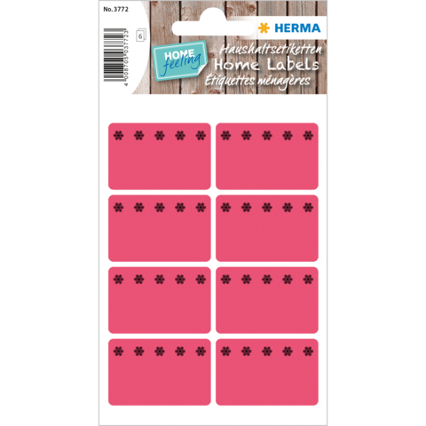 Rosa Etiketten mit schwarzen Blütenmotiven, auf einem Bogen angeordnet. Ideal für die Beschriftung von Haushaltsgegenständen.