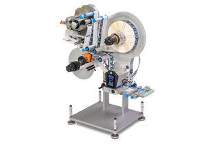 A labeling machine with multiple rollers that applies labels to products. It features various mechanical components and a sturdy base.