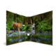 A tiger walks through a body of water in a forest, surrounded by lush greenery and trees.