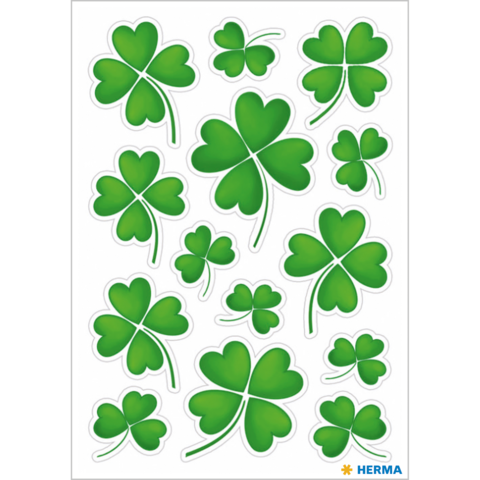 Grüne Kleeblätter in verschiedenen Größen und Formen auf einem weißen Hintergrund, ideal für Dekoration oder Bastelprojekte.