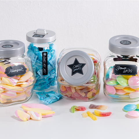 Colorful candies in glass containers, labeled 'Homemade,' 'Icy Treats,' and 'Candy Snacks,' are displayed against a white background.
