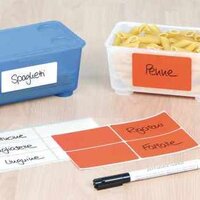 Application image of multipurpose labels on plastic boxes.