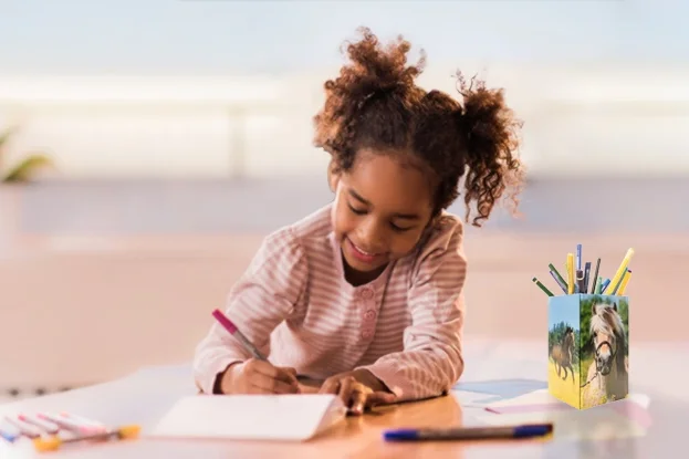Girl at the desk with a HERMA pencil holder