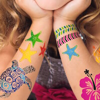 Arms adorned with many tattoos.